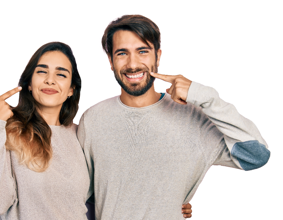 A cheerful couple pointing to their bright smiles, showcasing the results of professional dental treatments for healthy teeth.